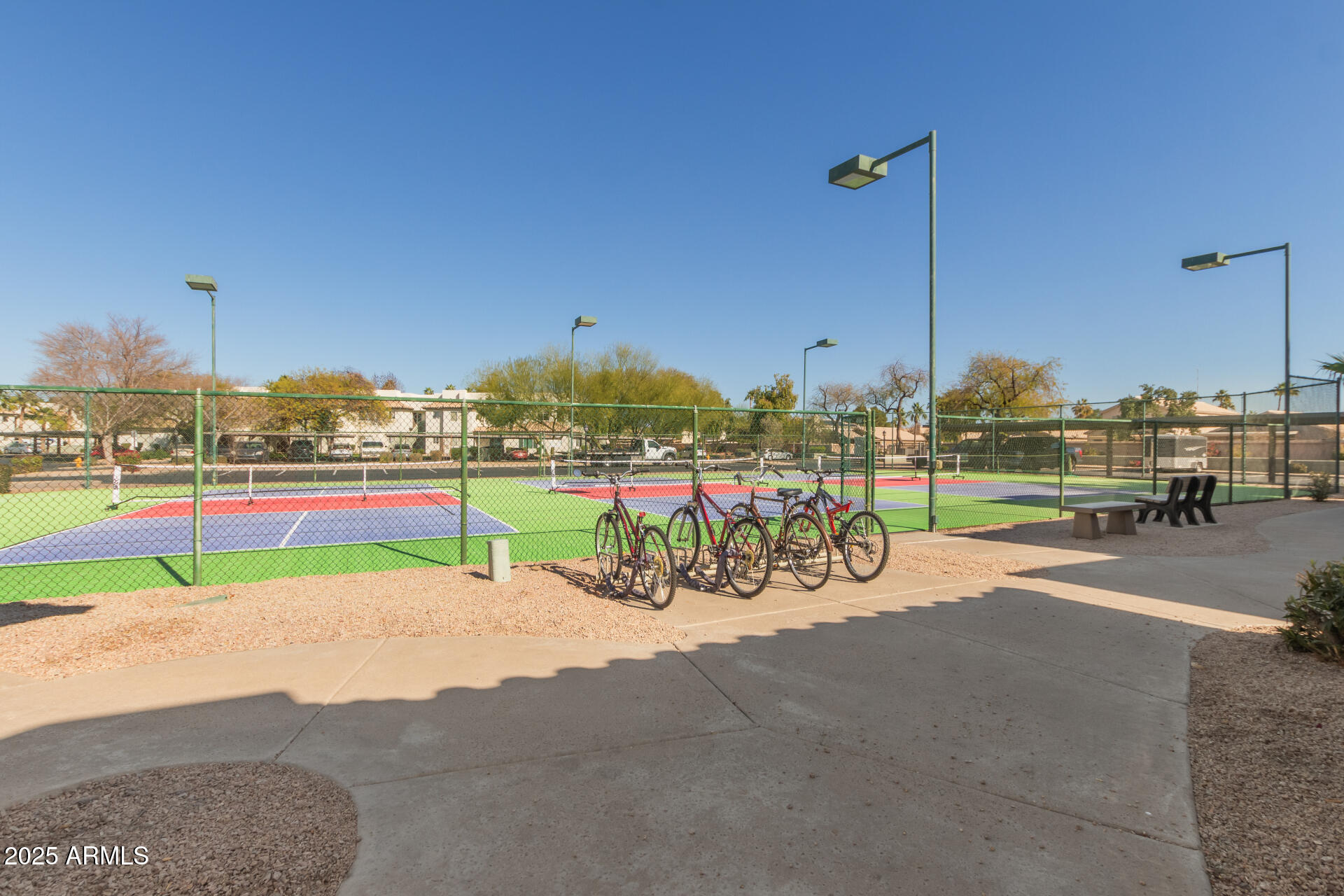 1825 West Ray Road, Unit 2116 Chandler, AZ 85224 - Photo 32 of 44 a view of a park with swings