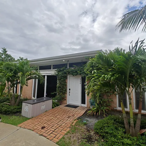 a kitchen with sink cabinets and outdoor view