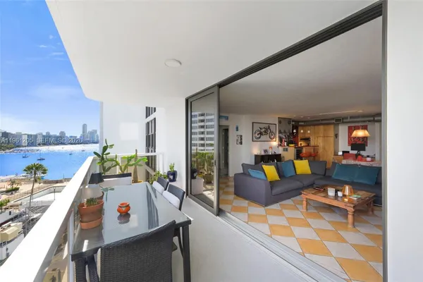 a view of a living room and dining room
