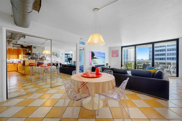 a living room with furniture and a table