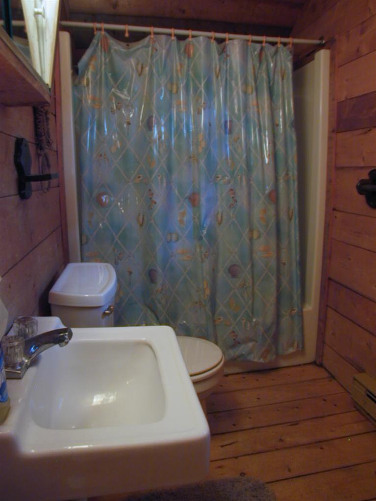 106 Cottontail Road, Unit A3 Wellfleet, MA 02667 - Photo 10 of 14 a bathroom with a sink and a toilet