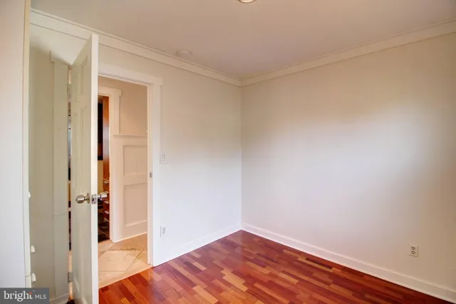 a view of a small space with wooden floor