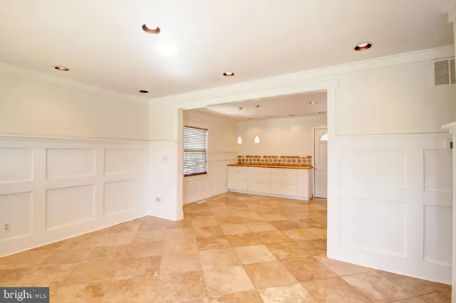 a view of a kitchen with a sink