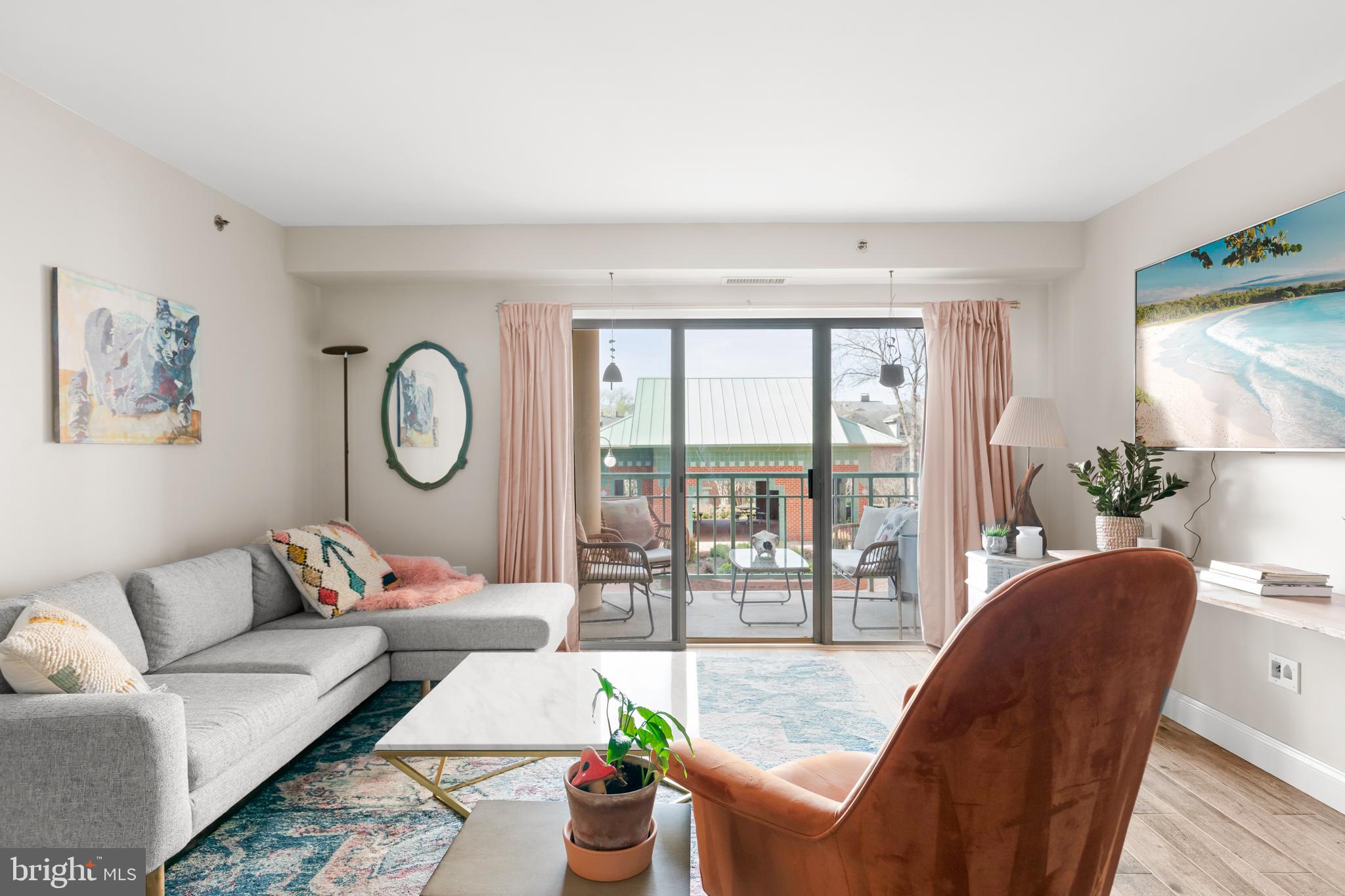 545 East Braddock Road, Unit 206 Alexandria, VA 22314 - Photo 8 of 29 Family Room Opens to Cozy Balcony