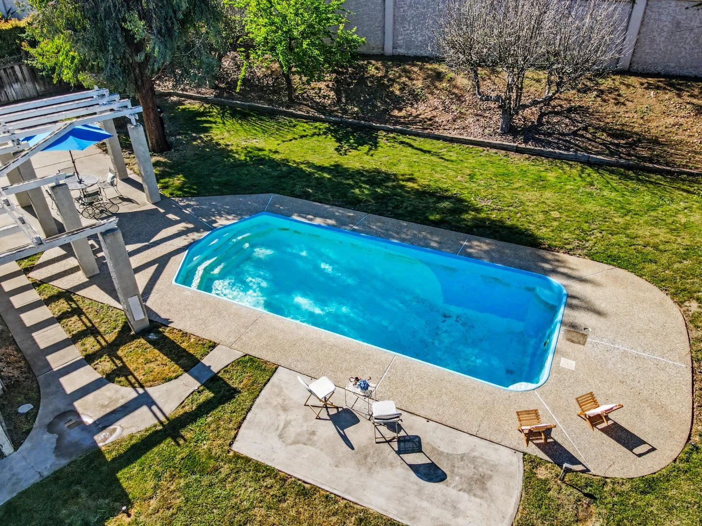 6455 Kensington Place Gilroy, CA 95020 - Photo 30 of 32 an aerial view of a house with a yard