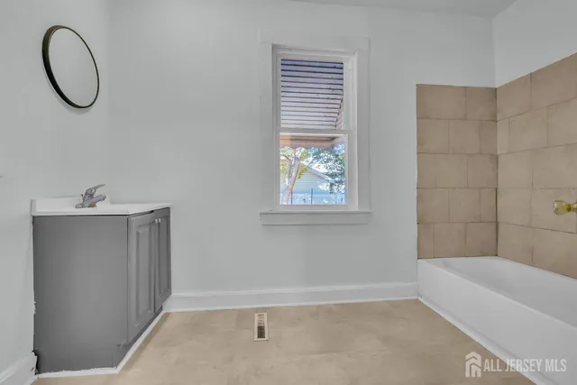 a view of a hallway with windows