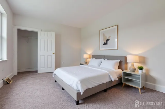 a view of an empty room and entryway