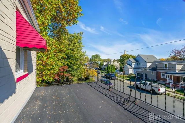 a view of empty room with wooden ceiling