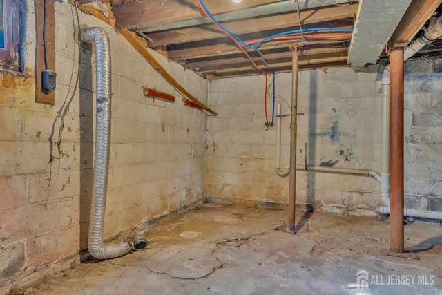 a view of a garden with wooden fence