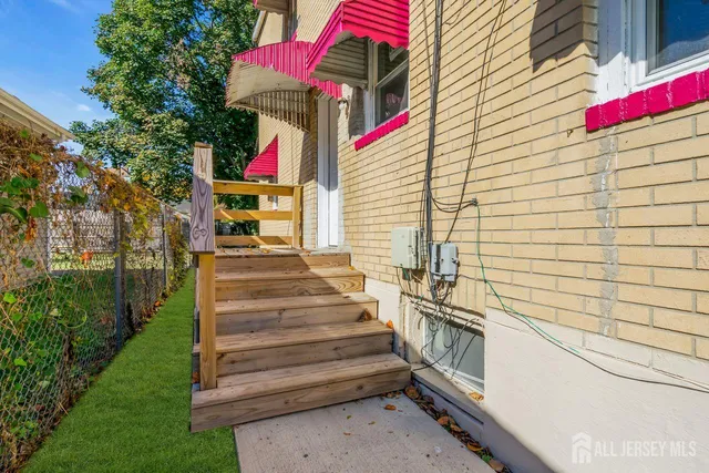 a view of a park with large trees