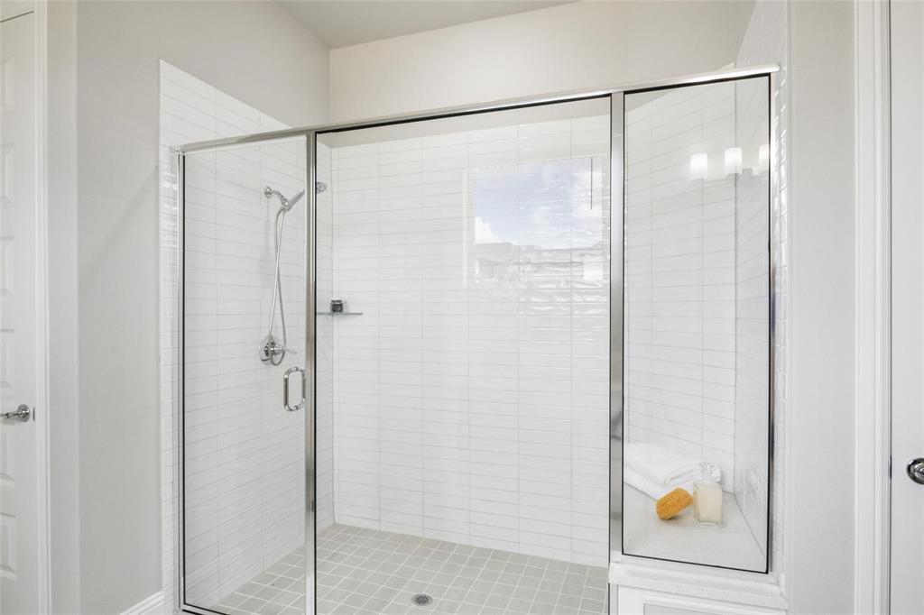 7411 Joshua Road Frisco, TX 75033 - Photo 15 of 40 a bathroom with a shower