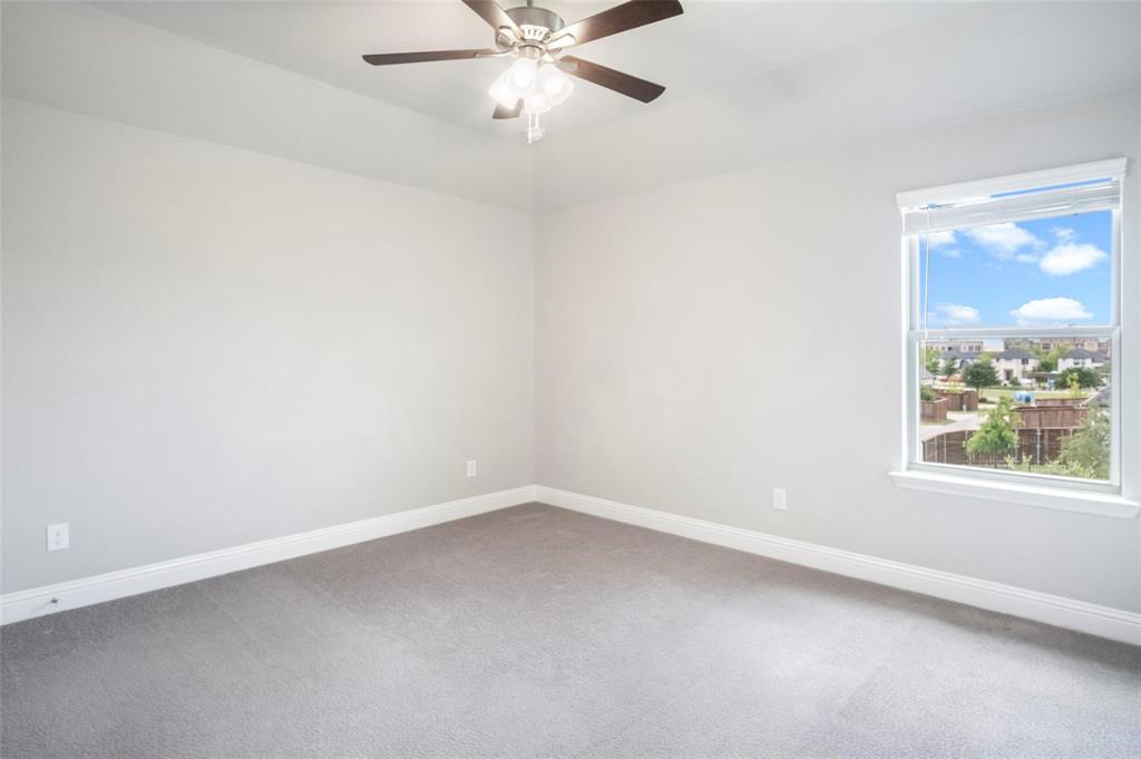 7411 Joshua Road Frisco, TX 75033 - Photo 30 of 40 an empty room with a window