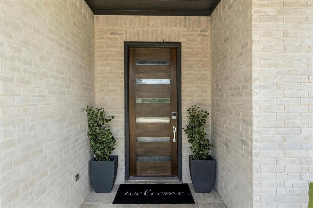 7411 Joshua Road Frisco, TX 75033 - Photo 3 of 40 a view of a wooden door