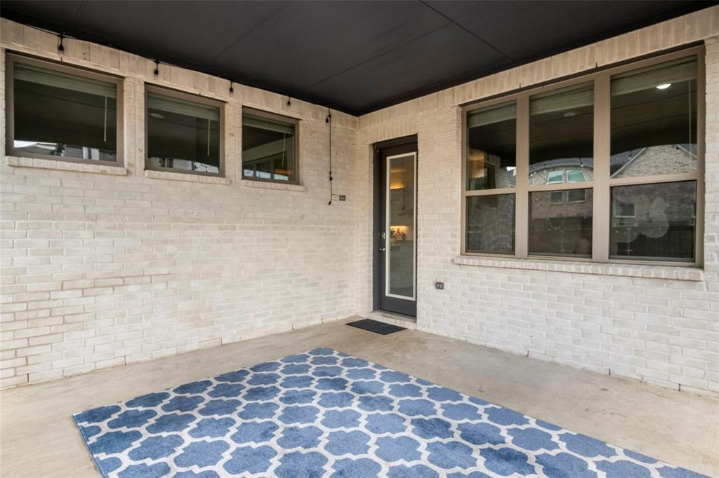 7411 Joshua Road Frisco, TX 75033 - Photo 35 of 40 a view of a entryway door front of a house