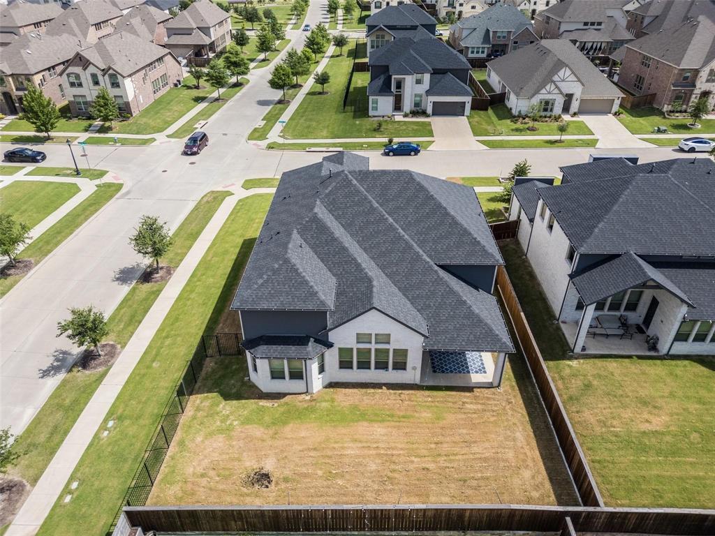 7411 Joshua Road Frisco, TX 75033 - Photo 40 of 40 an aerial view of a house with swimming pool