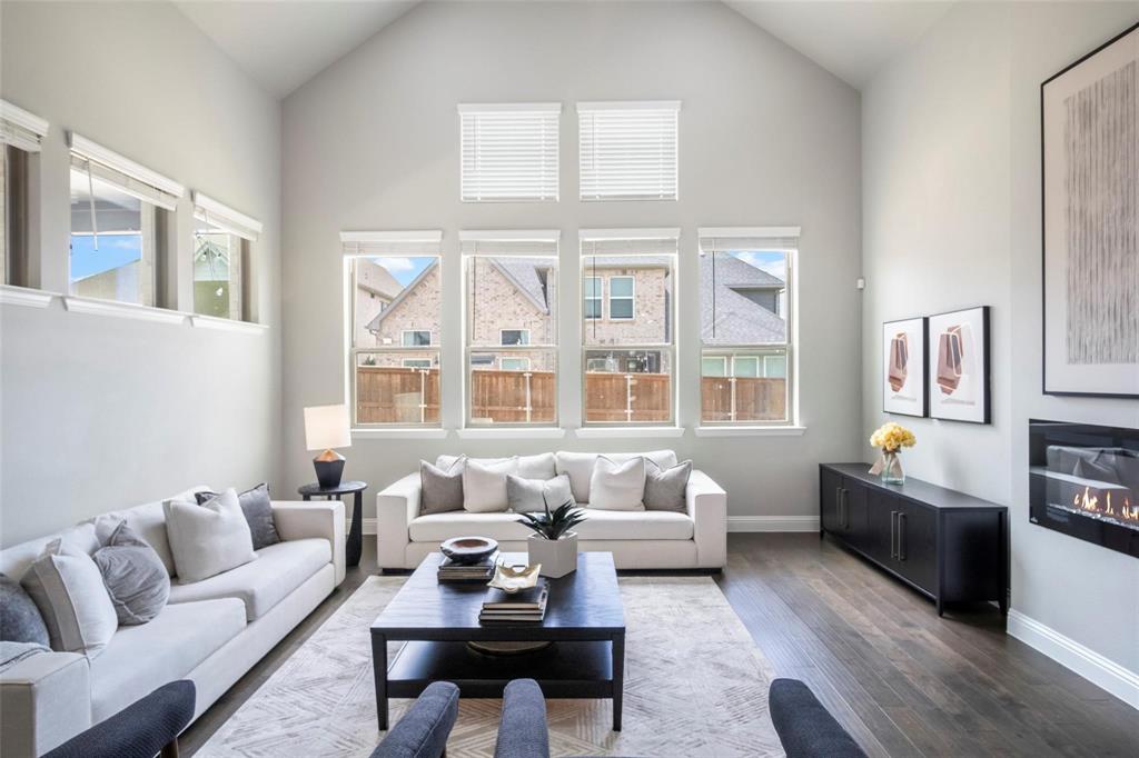 7411 Joshua Road Frisco, TX 75033 - Photo 5 of 40 a living room with furniture and a large window