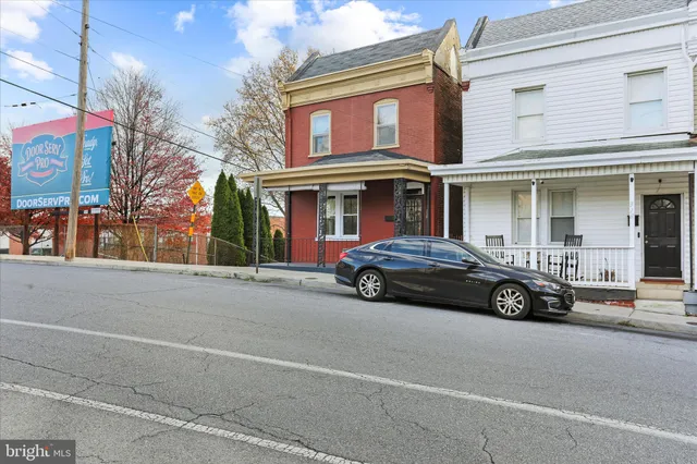 a car parked in front of a building