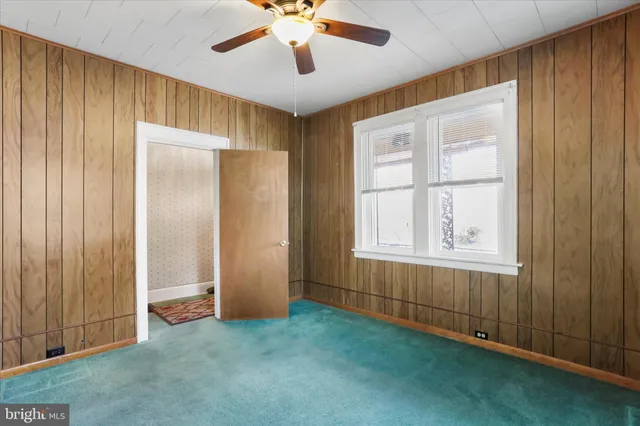 a kitchen with a refrigerator sink and stove