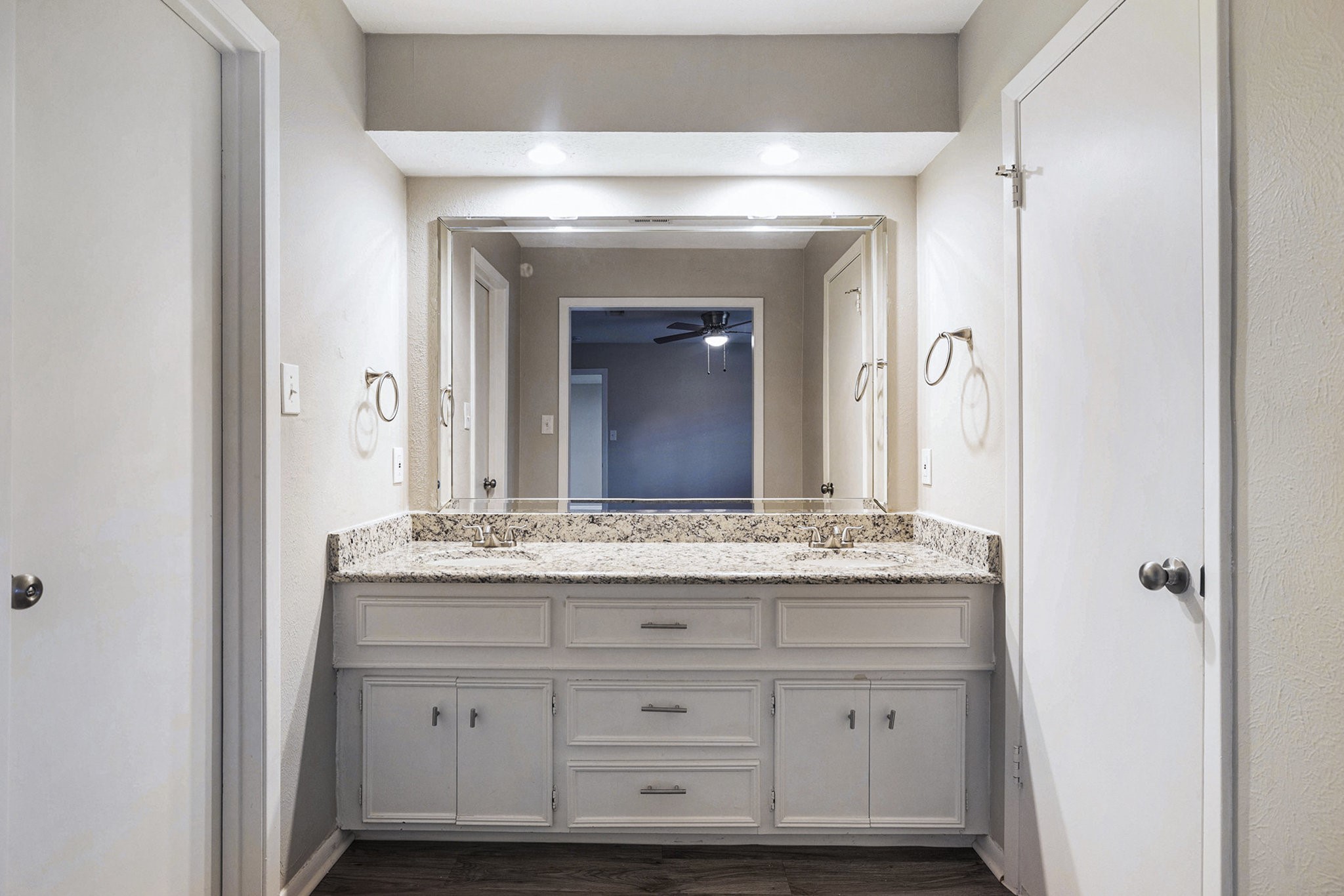 29118 Raestone Street Spring, TX 77386 - Photo 14 of 21 a bathroom with a granite countertop sink vanity and mirror