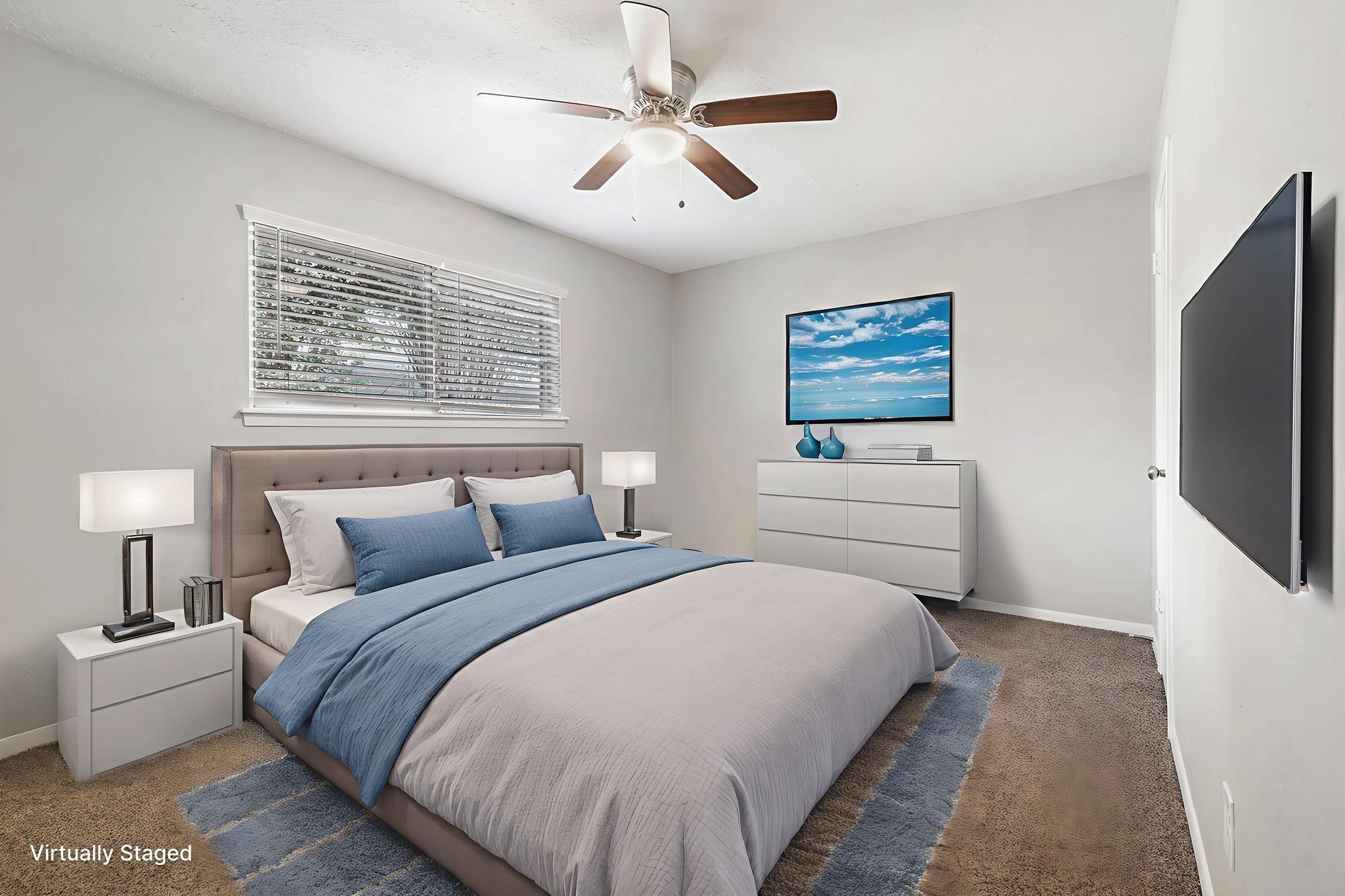 29118 Raestone Street Spring, TX 77386 - Photo 16 of 21 a bedroom with a bed and a flat screen tv