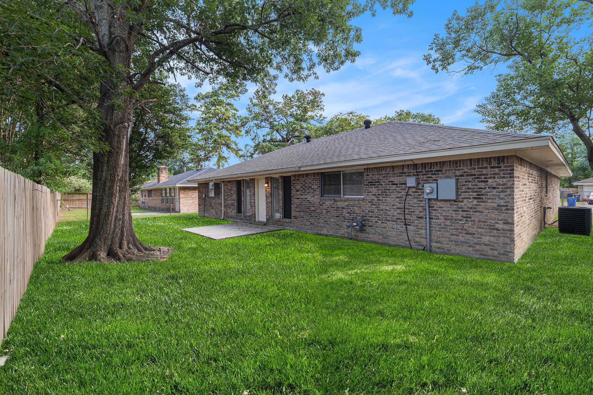 29118 Raestone Street Spring, TX 77386 - Photo 18 of 21 a view of a house with a backyard