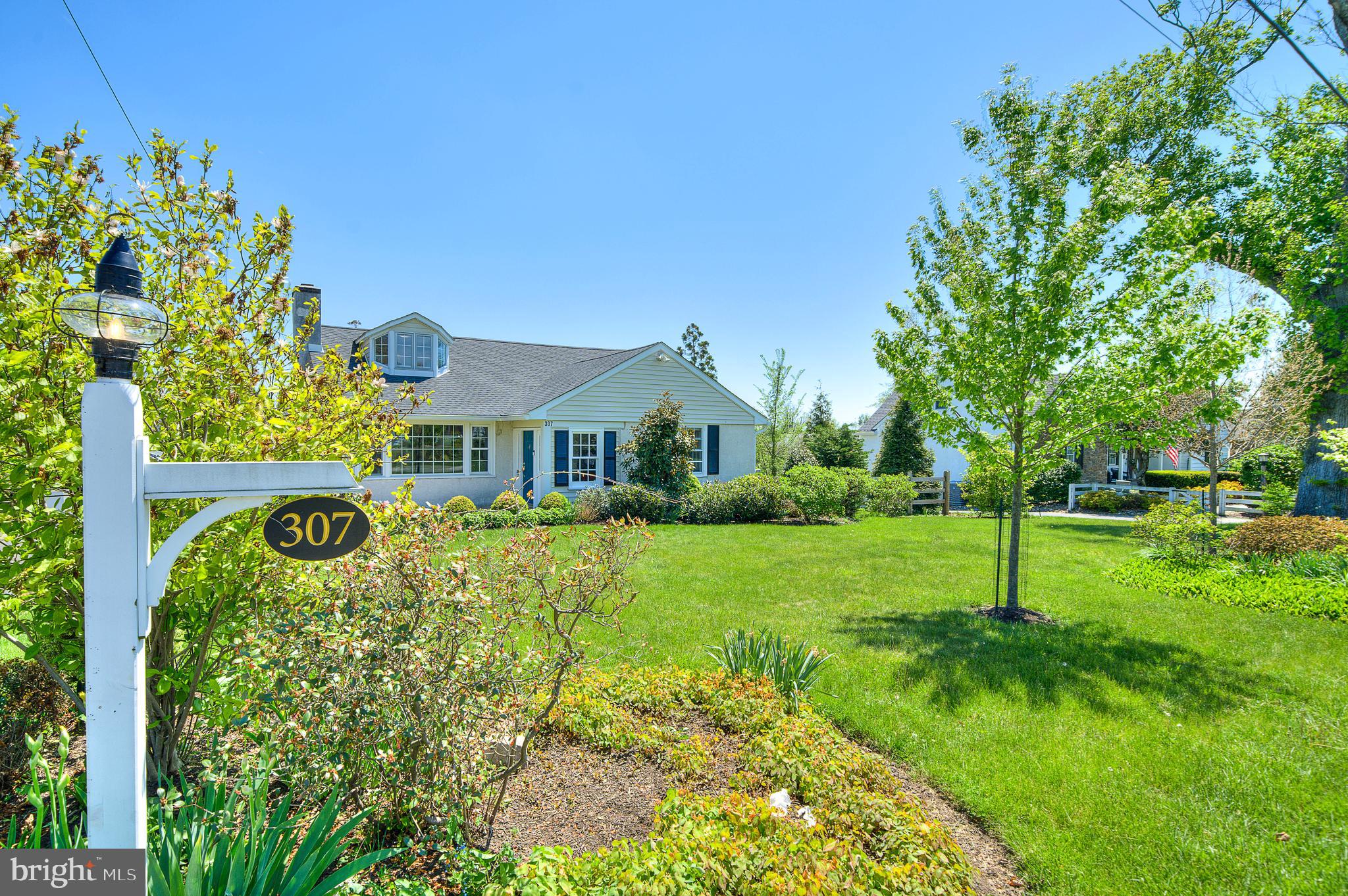 307 Washington Lane Fort Washington, PA 19034 - Photo 1 of 32 a house view with a garden space