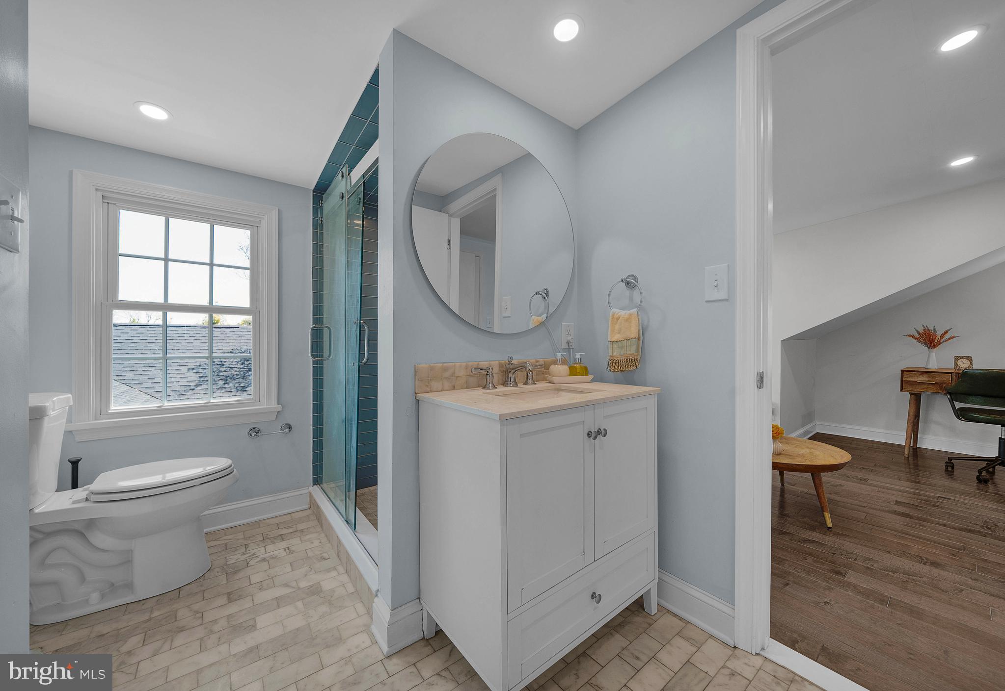 307 Washington Lane Fort Washington, PA 19034 - Photo 26 of 32 a view of bathroom with a toilet sink and a mirror