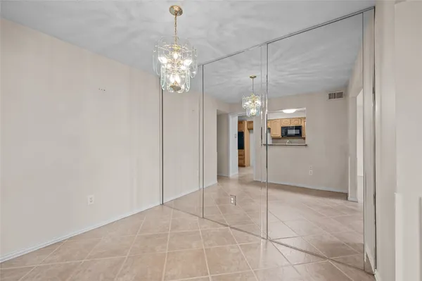 a kitchen with stainless steel appliances granite countertop a sink and a stove