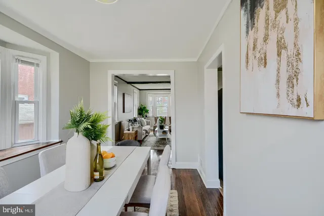 a view of a living room and dining room