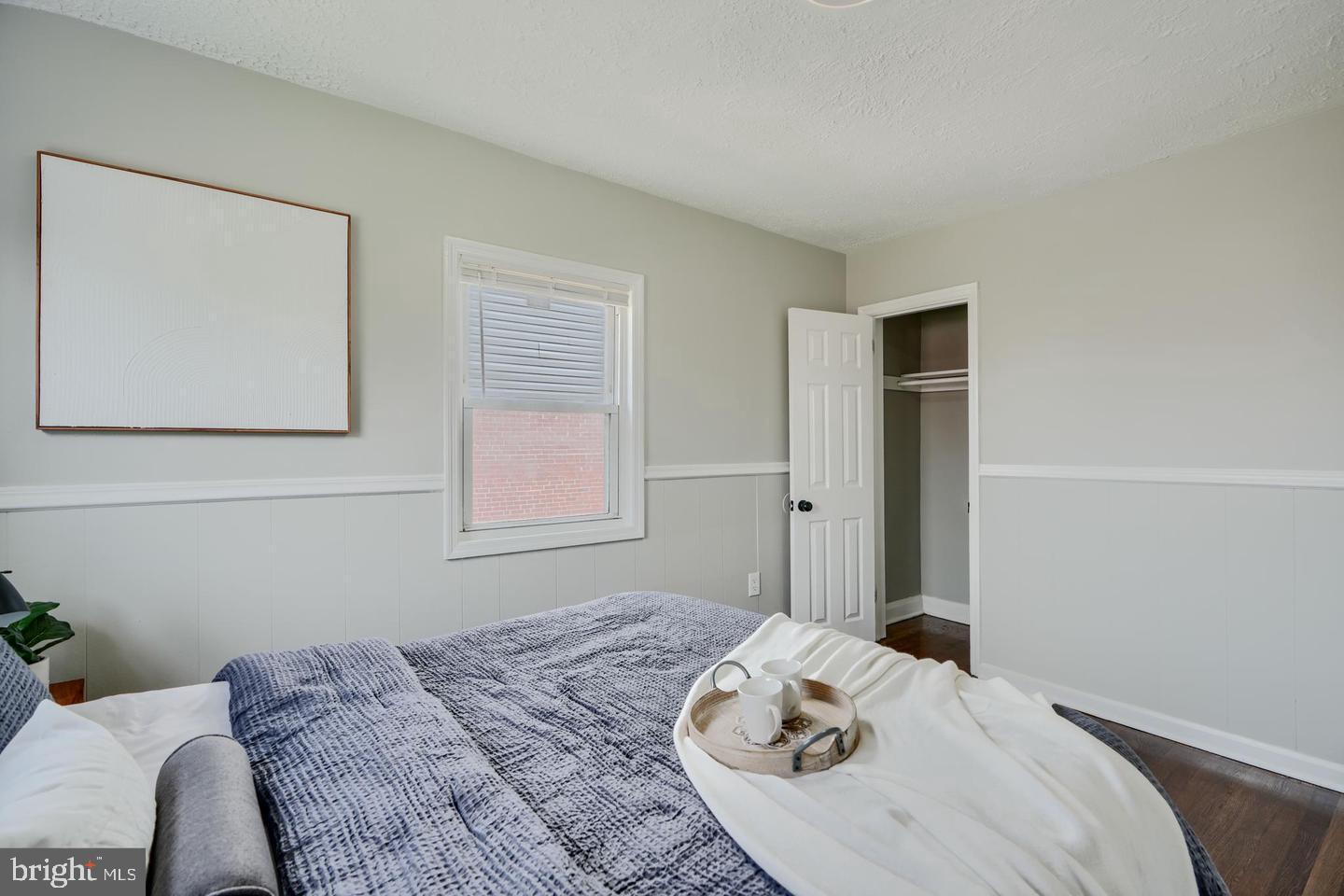 1944 Quentin Road Dundalk, MD 21222 - Photo 17 of 41 a bedroom with a bed and a window