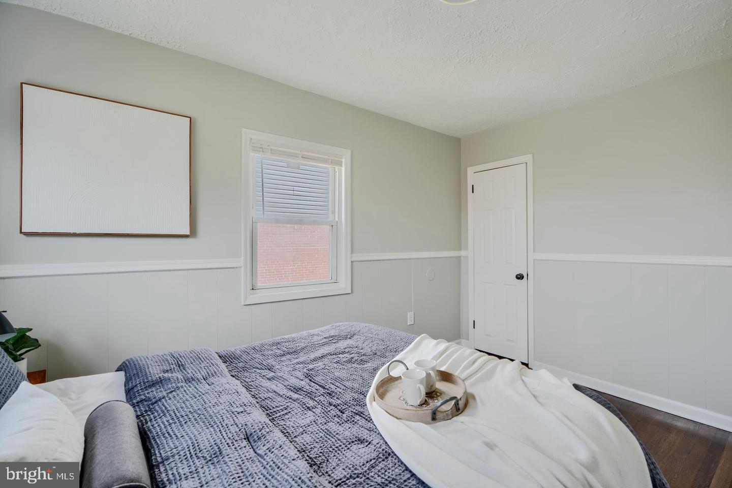 1944 Quentin Road Dundalk, MD 21222 - Photo 18 of 41 a bedroom with a bed and a window