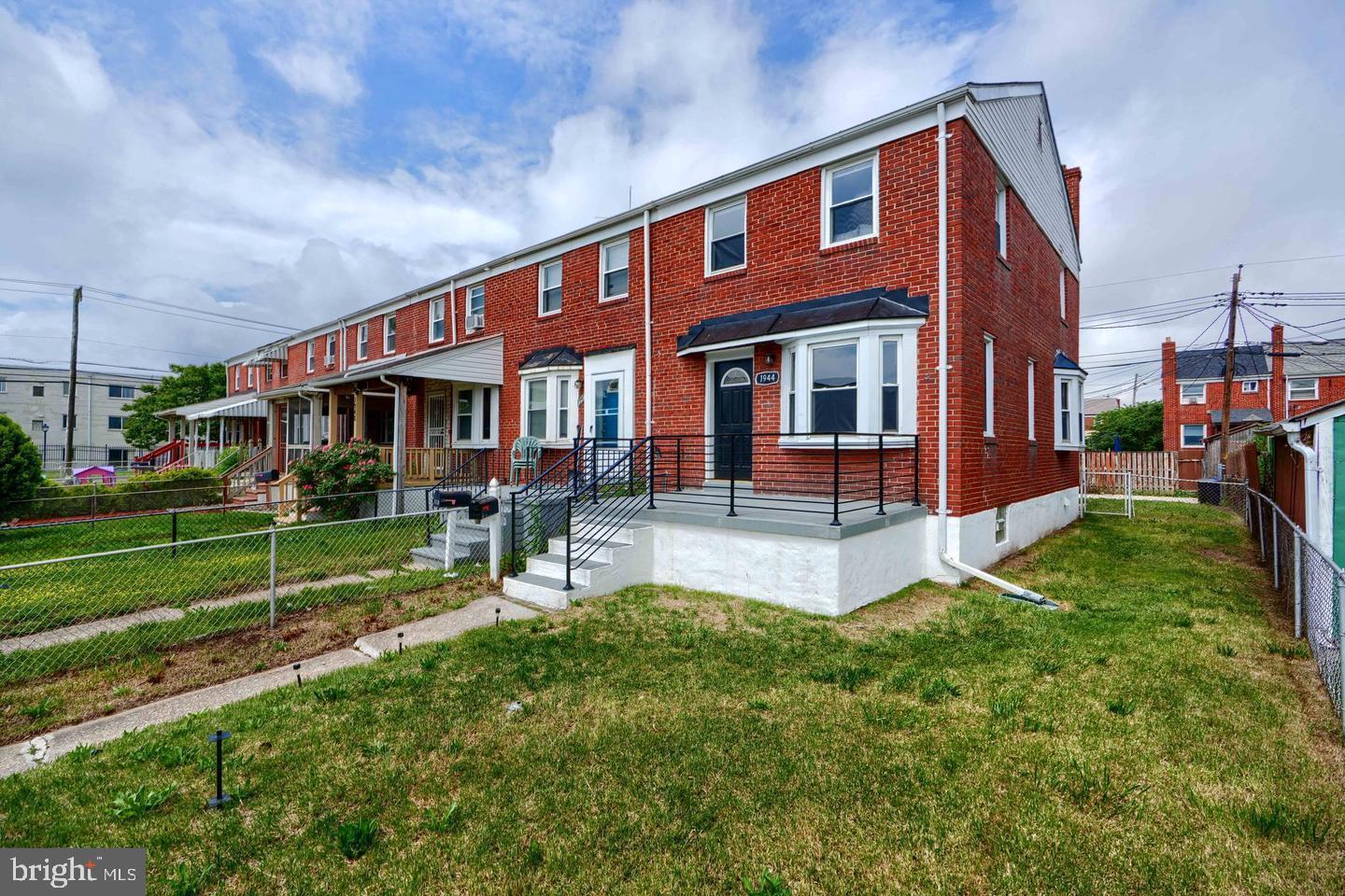 1944 Quentin Road Dundalk, MD 21222 - Photo 2 of 41 a view of a house with a yard deck and a large tree