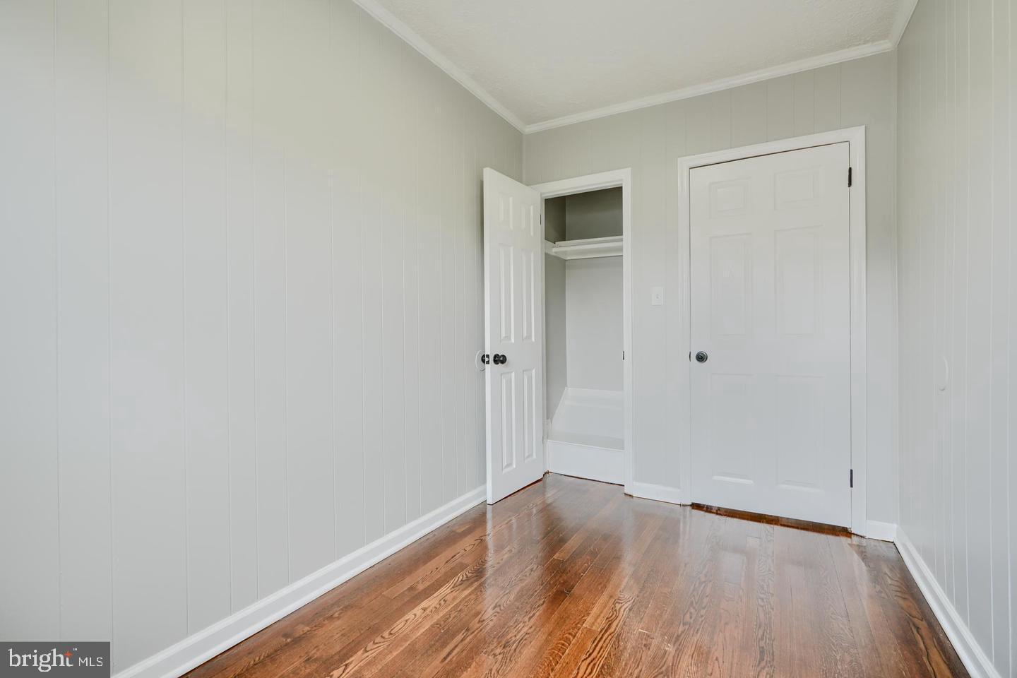 1944 Quentin Road Dundalk, MD 21222 - Photo 24 of 41 a view of an empty room with wooden floor