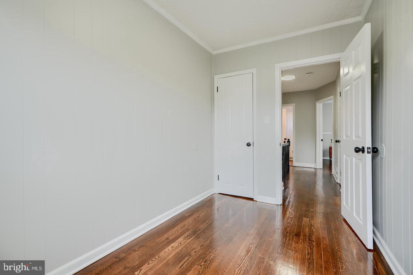 1944 Quentin Road Dundalk, MD 21222 - Photo 25 of 41 a view of a hallway with wooden floor