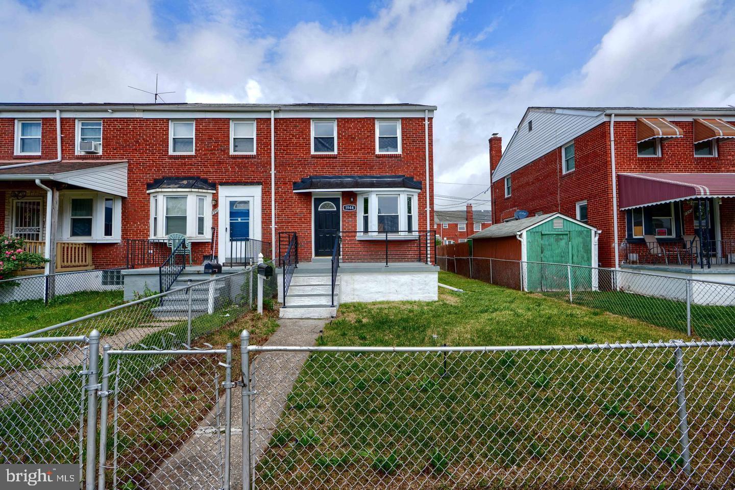 1944 Quentin Road Dundalk, MD 21222 - Photo 40 of 41 a front view of a house with a yard