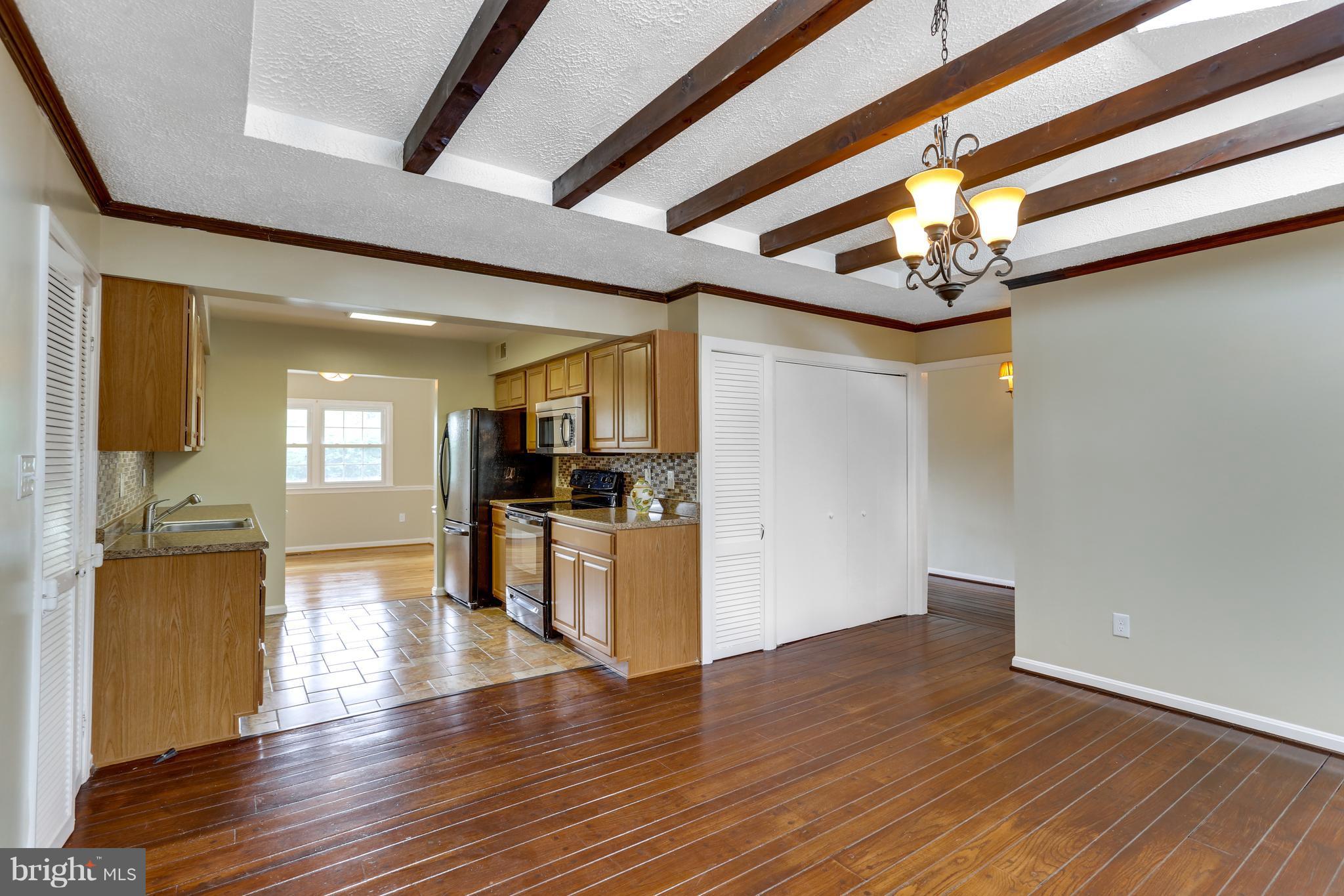 8412 Schultz Road Clinton, MD 20735 - Photo 7 of 30 Breakfast Room with Skylights and Beamed Ceiling