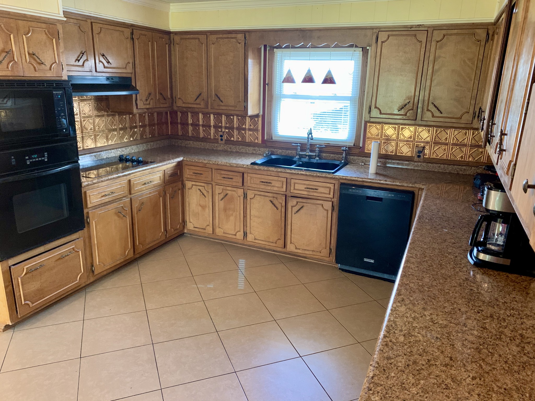 30 Philadelphia Road Lebanon, TN 37087 - Photo 11 of 27 a kitchen with a sink a stove cabinets and a window