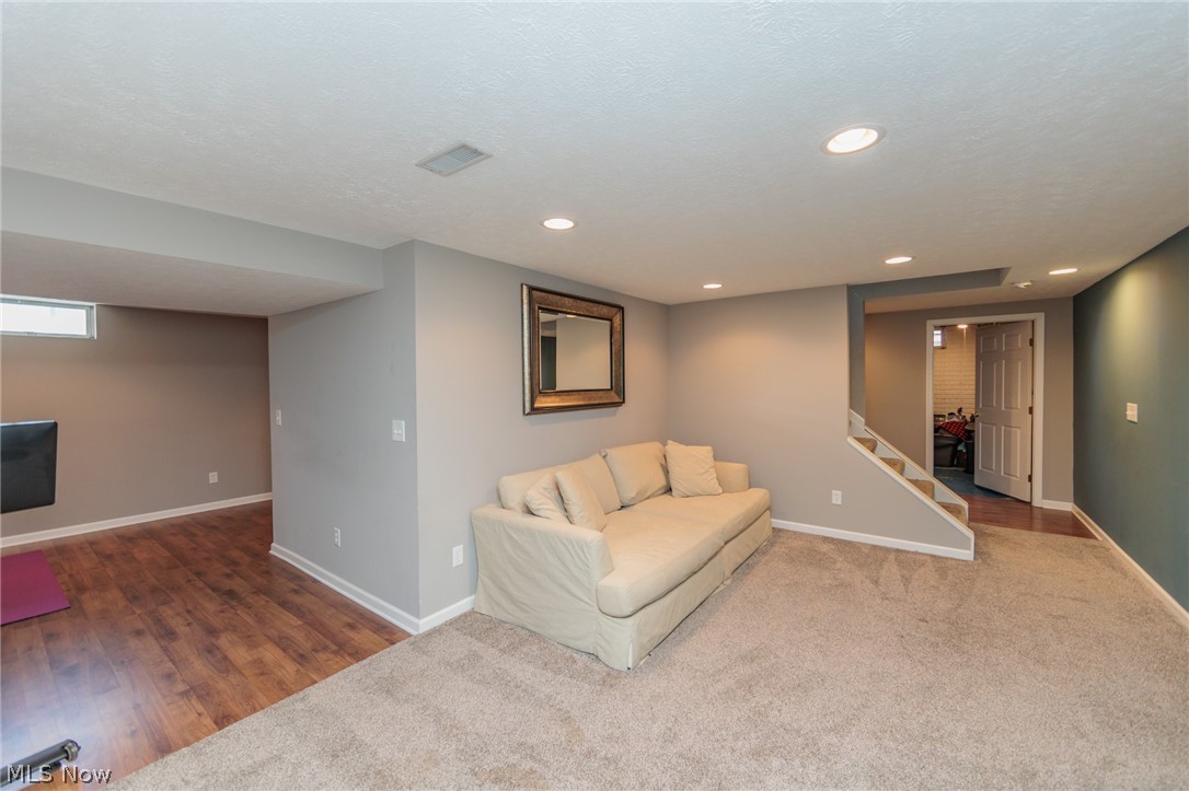 5630 Oak Point Road Lorain, OH 44053 - Photo 32 of 44 basement entertainment room featuring carpet