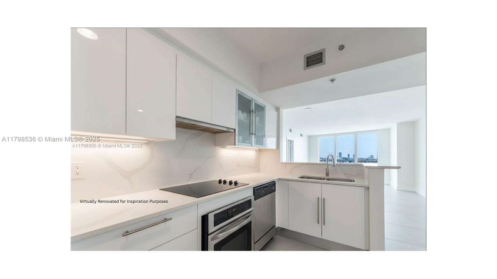 335 South Biscayne Boulevard, Unit 1012 Miami, FL 33131 - Photo 6 of 14 a kitchen with cabinets and stainless steel appliances