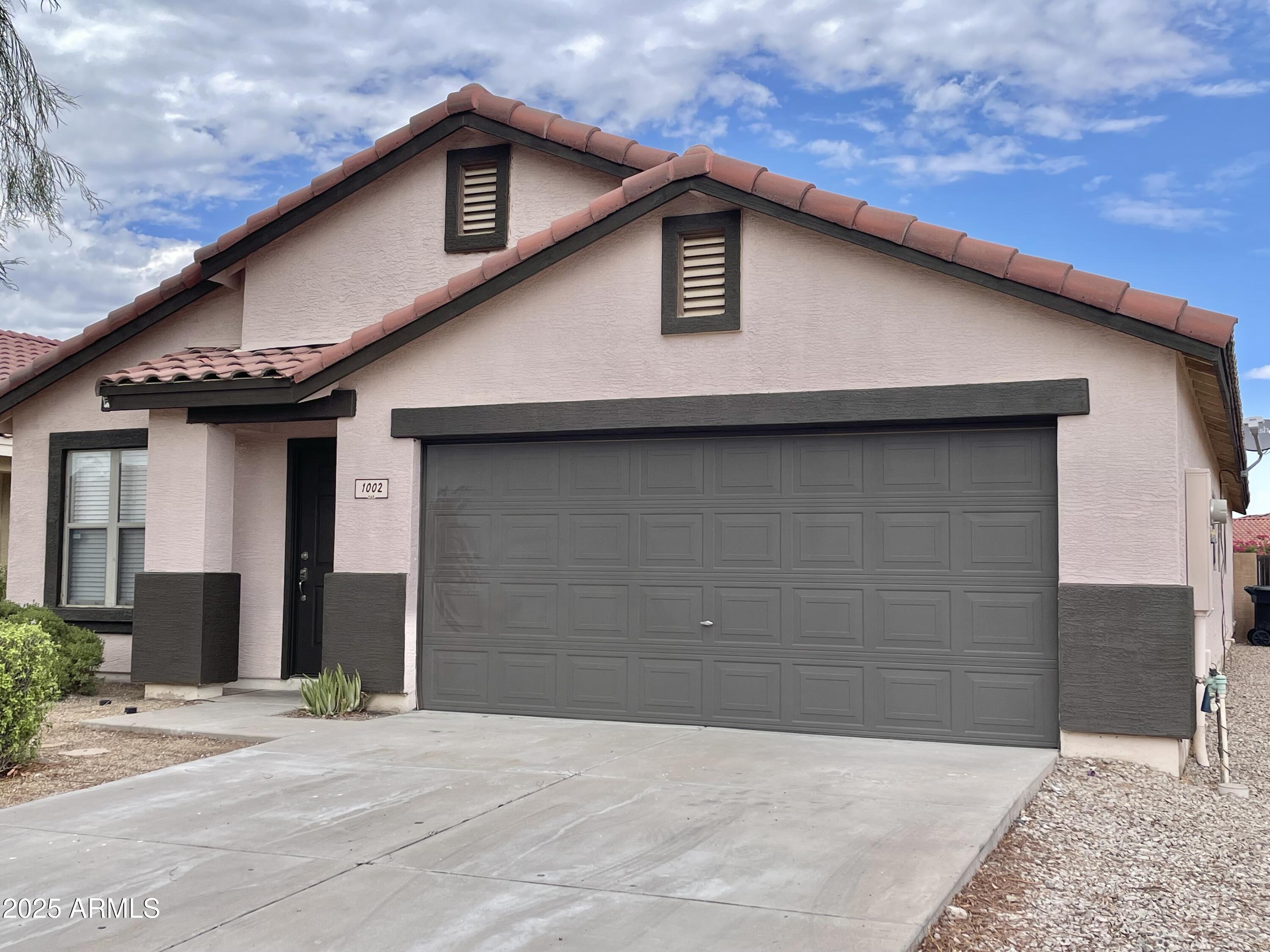 1002 East Arabian Drive Gilbert, AZ 85296 - Photo 1 of 23 a house with a outdoor space
