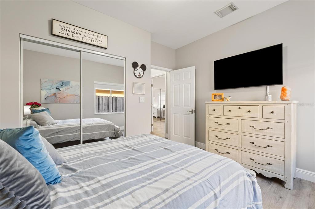 343 Southwest 187th Terrace Pembroke Pines, FL 33029 - Photo 31 of 48 a bedroom with a bed a window and a television