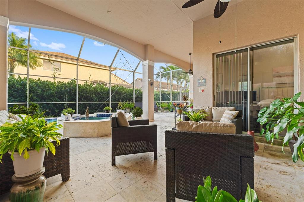 343 Southwest 187th Terrace Pembroke Pines, FL 33029 - Photo 36 of 48 a living room with furniture and a potted plant