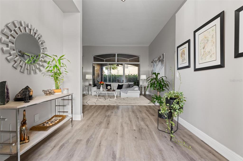 343 Southwest 187th Terrace Pembroke Pines, FL 33029 - Photo 6 of 48 a living room with furniture and a potted plant