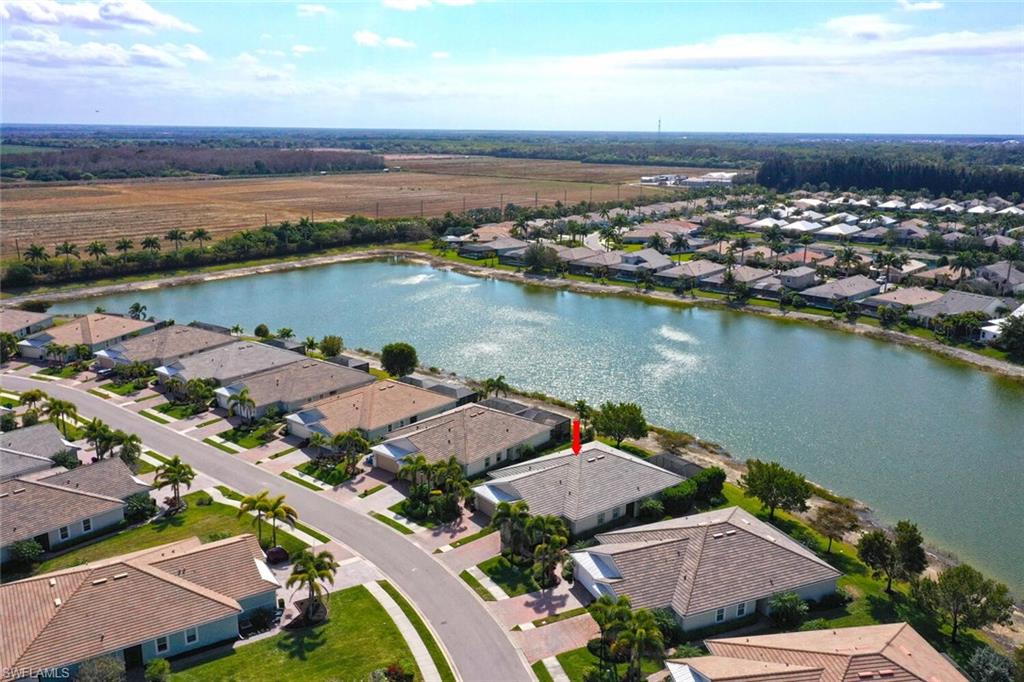 an aerial view of a city with lake view