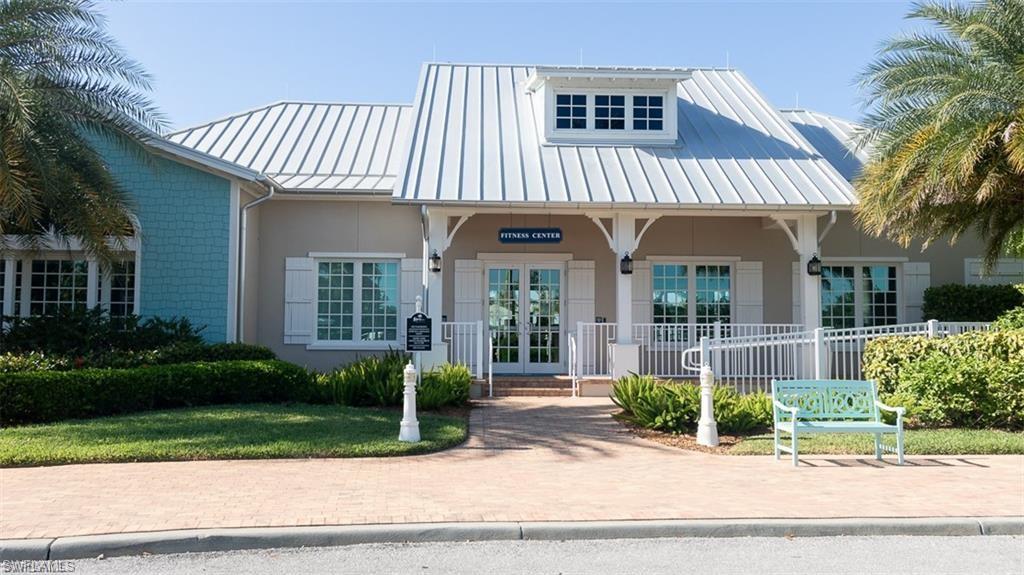 14827 Edgewater Circle Naples, FL 34114 - Photo 23 of 32 front view of a house