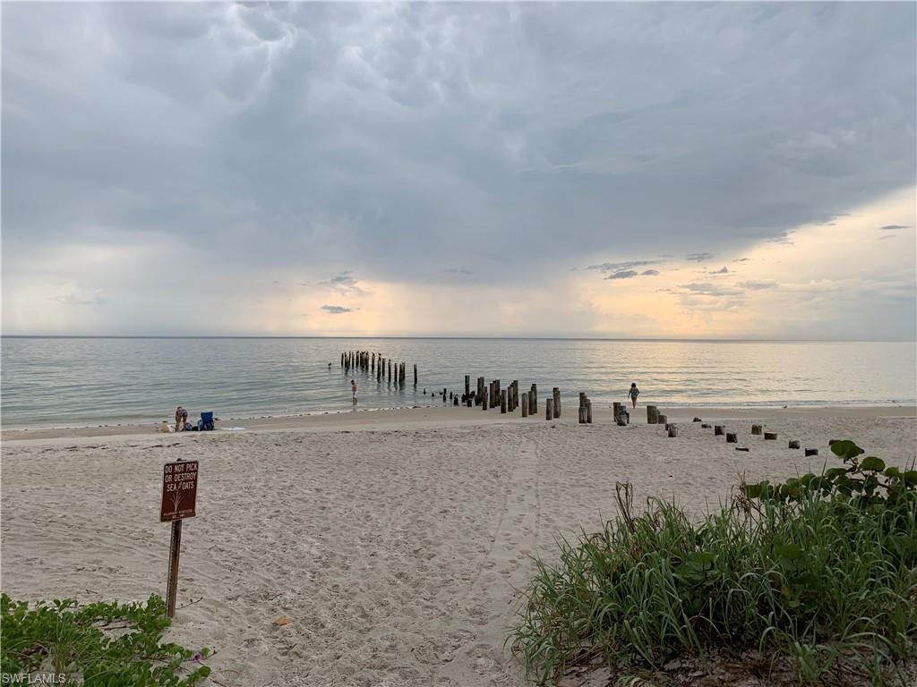 14827 Edgewater Circle Naples, FL 34114 - Photo 25 of 32 a view of ocean view with beach