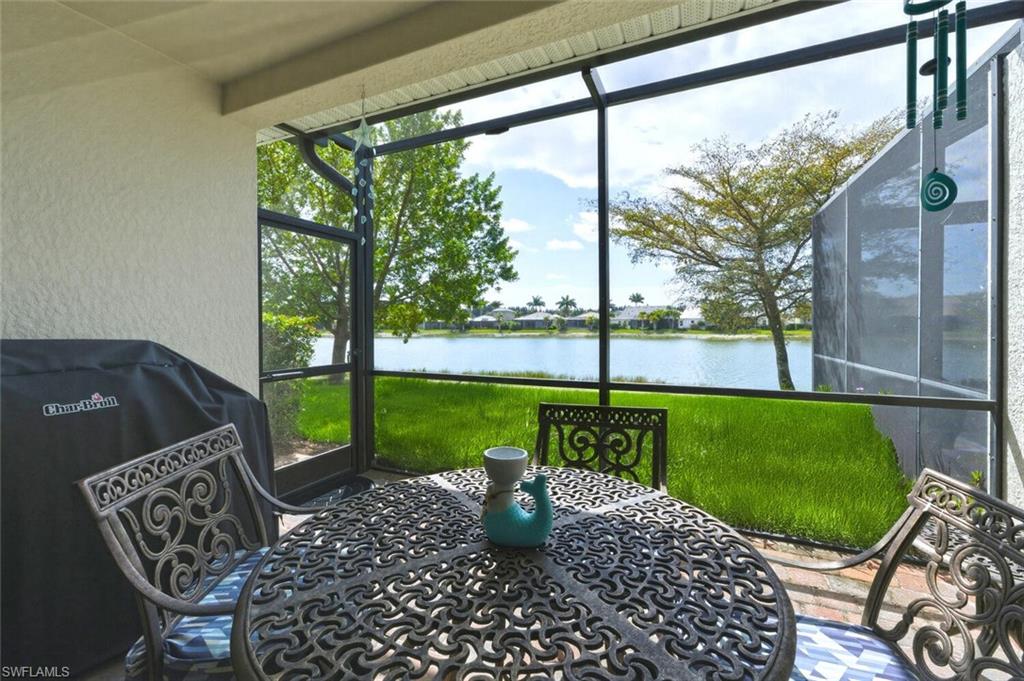 14827 Edgewater Circle Naples, FL 34114 - Photo 30 of 49 a view of a patio with backyard