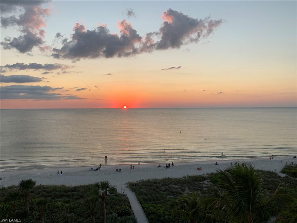 14827 Edgewater Circle Naples, FL 34114 - Photo 32 of 32 a view of an ocean beach and mountain