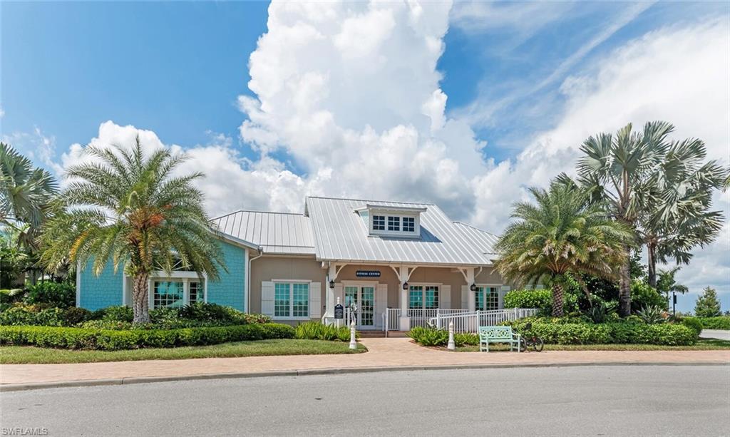 14827 Edgewater Circle Naples, FL 34114 - Photo 42 of 49 a view of a building with a street