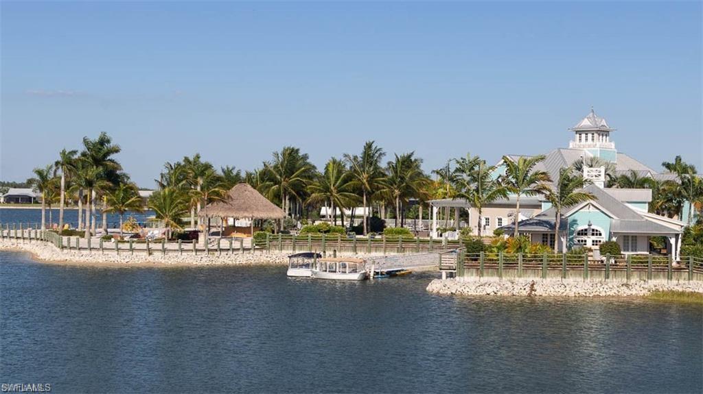 14827 Edgewater Circle Naples, FL 34114 - Photo 44 of 49 a view of an ocean with residential houses and lake view